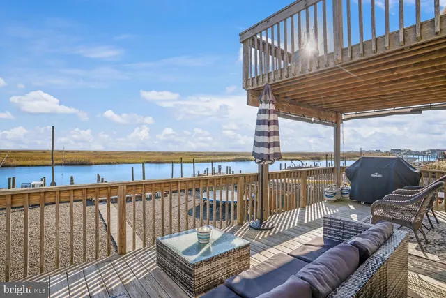 a view of a roof deck with couches
