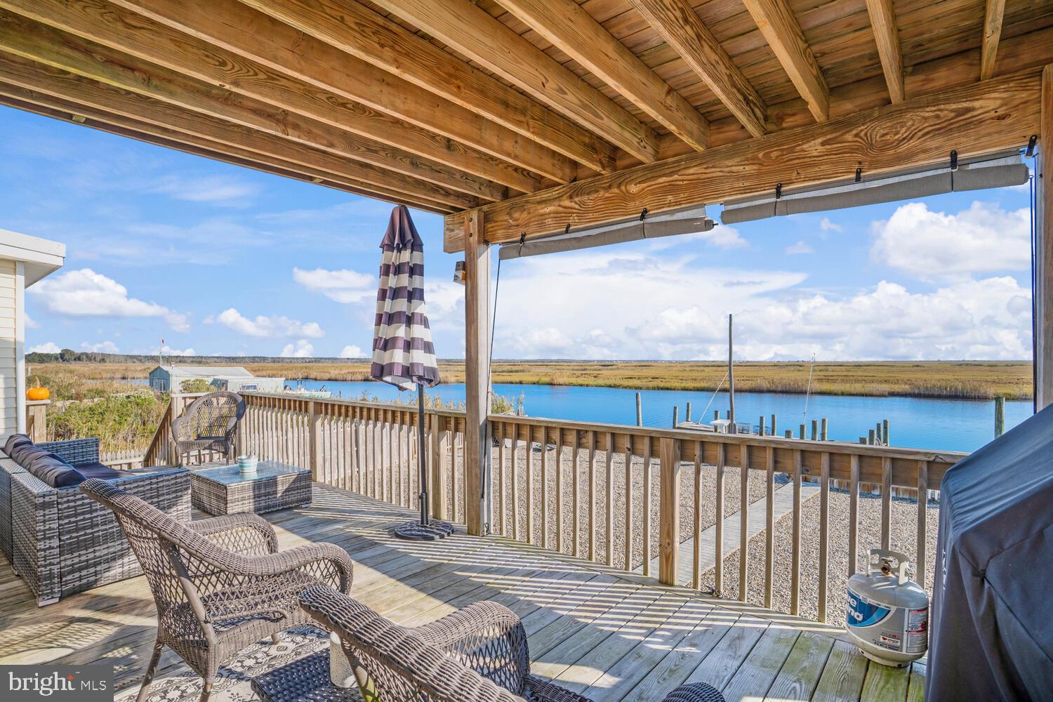 322 Dock Road West Creek, NJ 08092 - Photo 13 of 49 a roof deck with outdoor seating