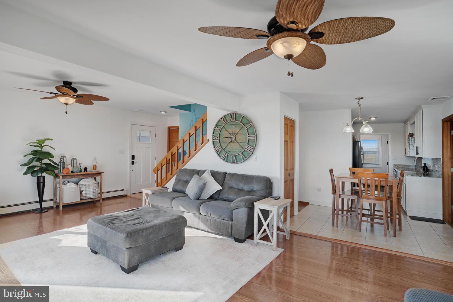 322 Dock Road West Creek, NJ 08092 - Photo 25 of 49 a living room with furniture a rug and a large window