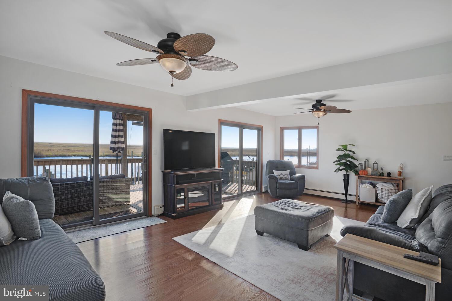 322 Dock Road West Creek, NJ 08092 - Photo 26 of 49 a living room with furniture and a flat screen tv