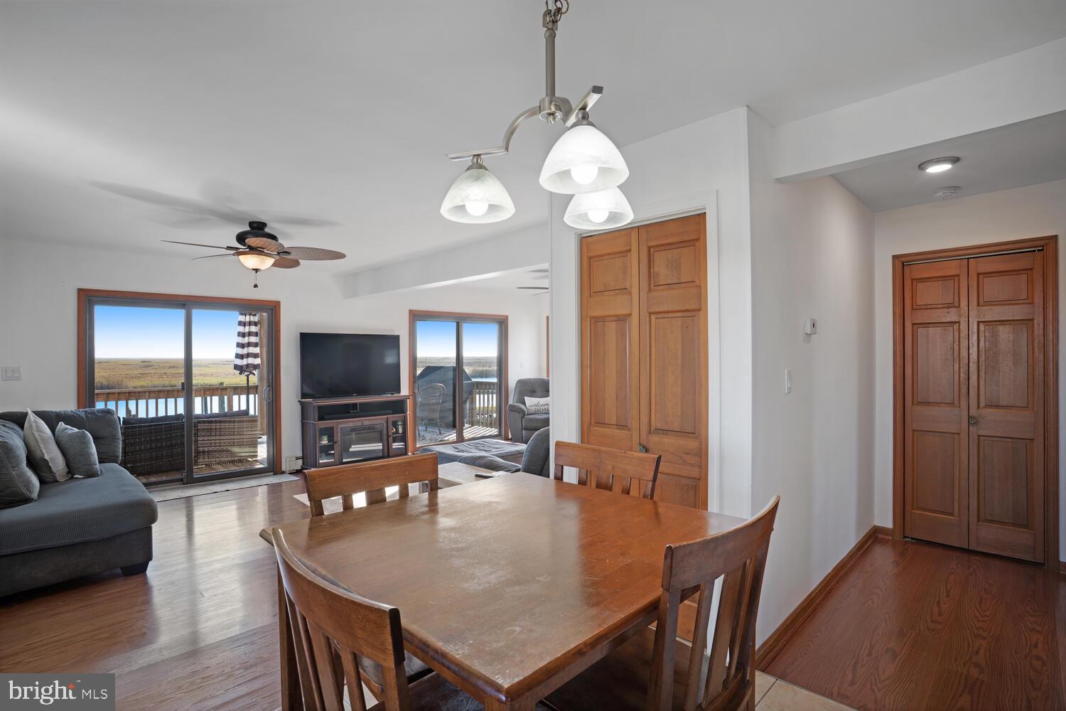 322 Dock Road West Creek, NJ 08092 - Photo 29 of 49 a view of a dining room with furniture window and wooden floor