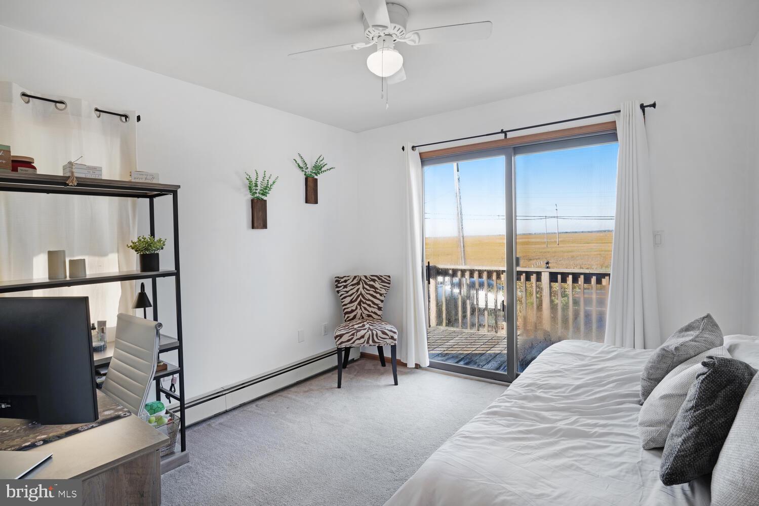 322 Dock Road West Creek, NJ 08092 - Photo 35 of 49 a bedroom with a bed and a television