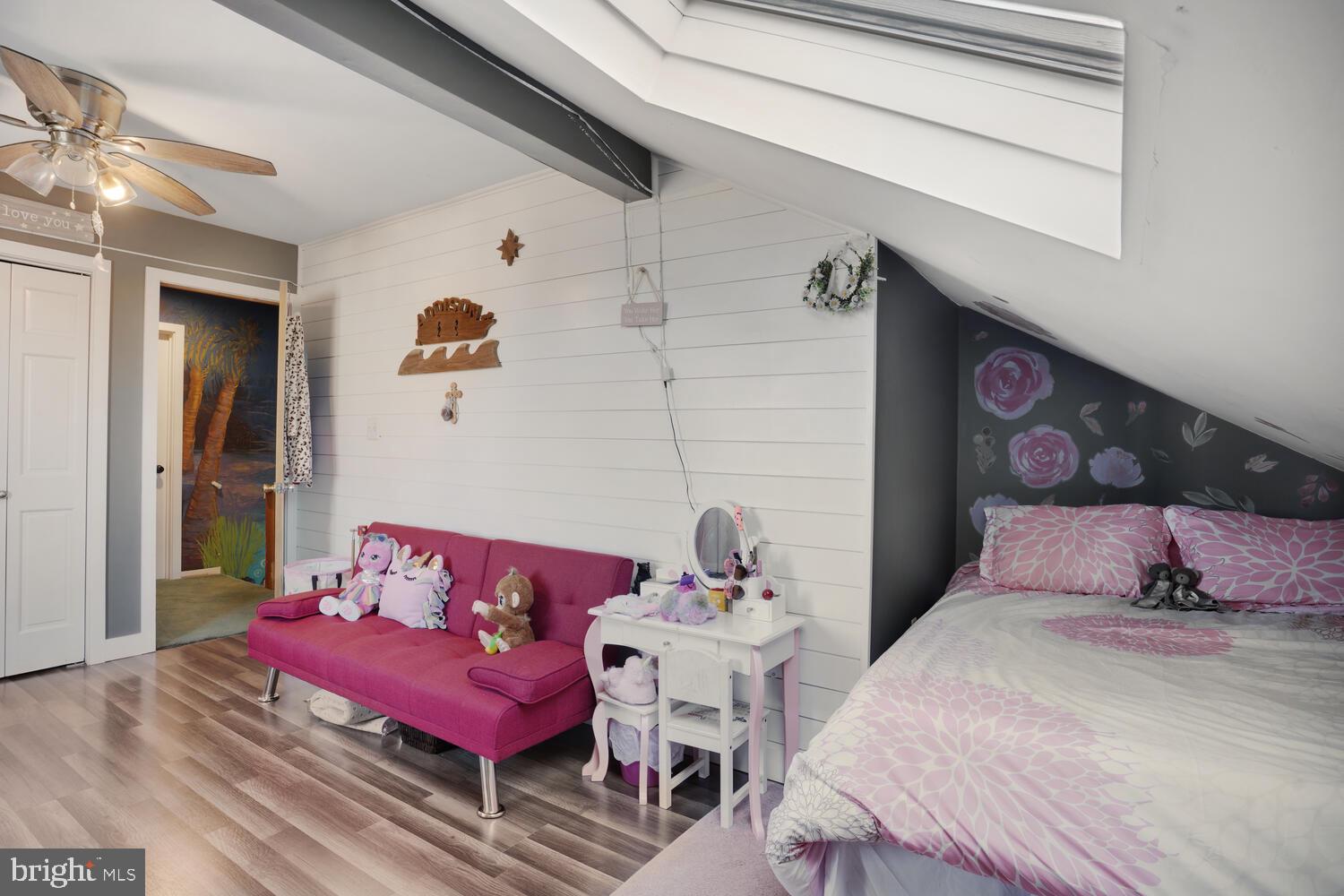 322 Dock Road West Creek, NJ 08092 - Photo 40 of 49 a bedroom with a bed and wooden floor