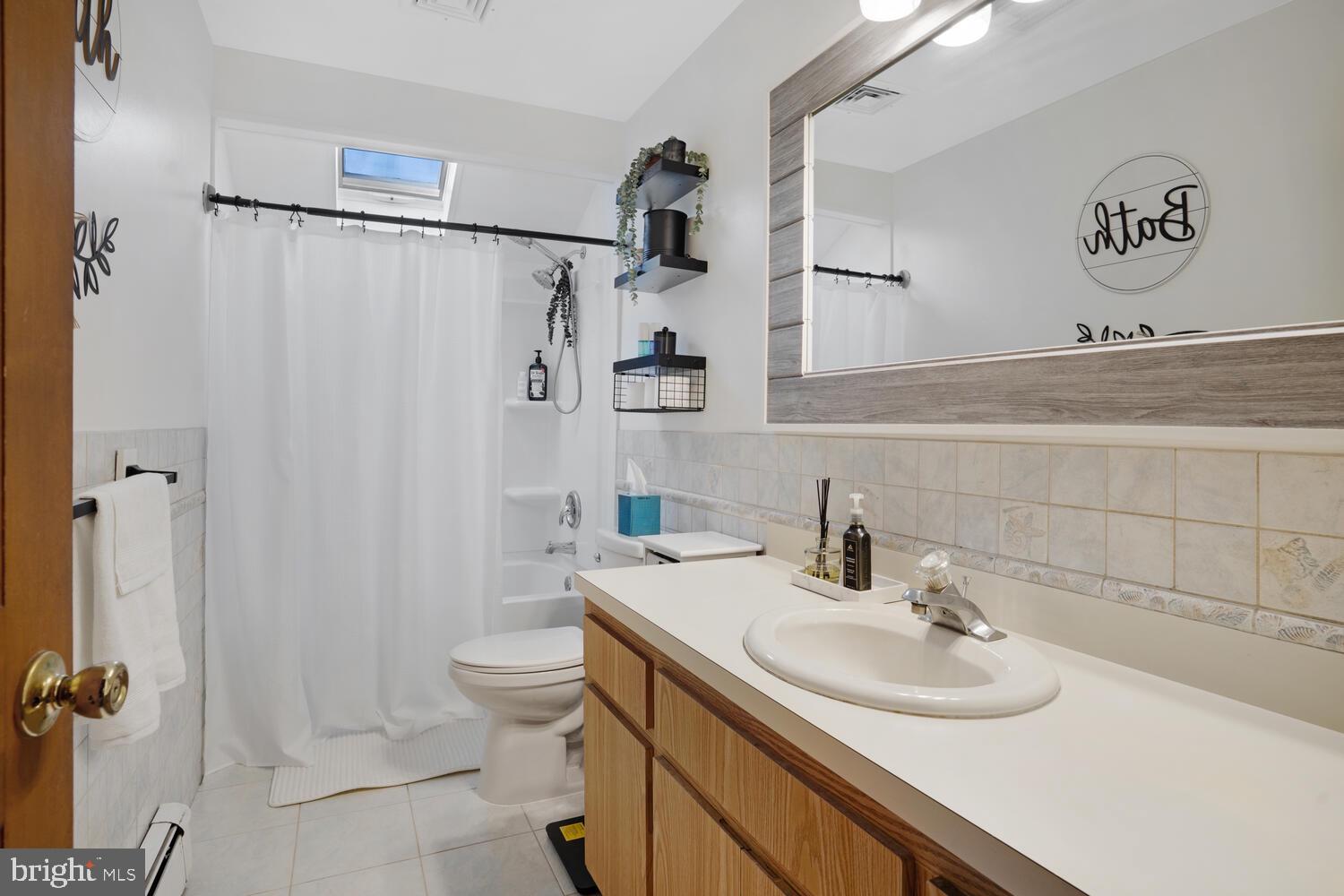 322 Dock Road West Creek, NJ 08092 - Photo 41 of 49 a bathroom with a sink toilet and shower