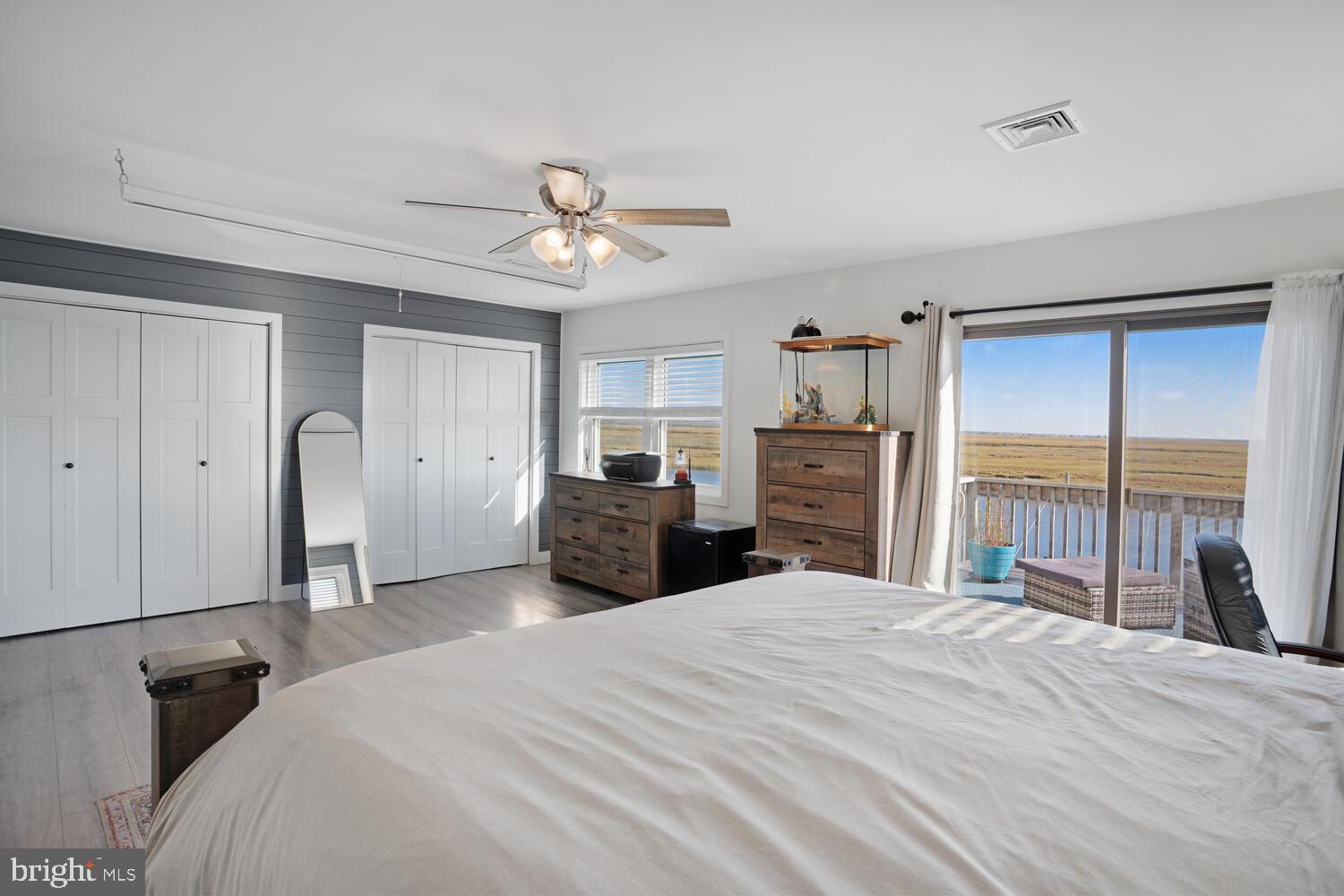 322 Dock Road West Creek, NJ 08092 - Photo 46 of 49 a bedroom with a large bed and dresser