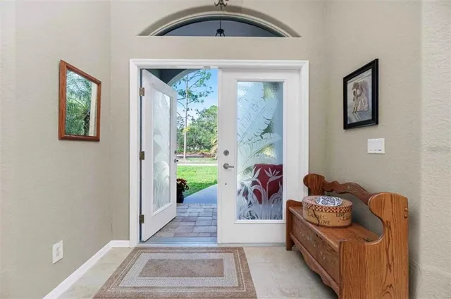 a bed room with a bed and a window