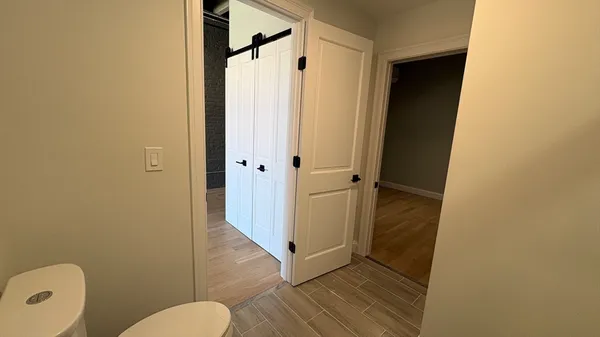 a bathroom with a granite countertop shower