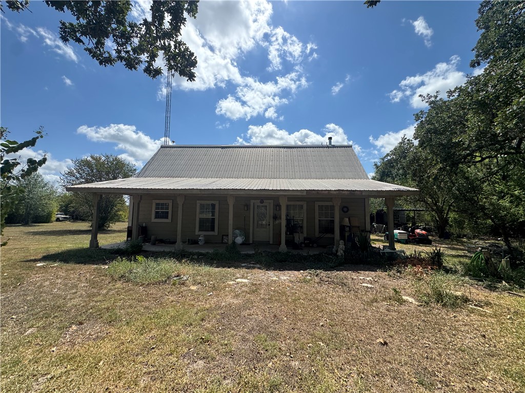 4224 Barnhill Lane Bryan, TX 77808 - Photo 7 of 7 a view of a house with a yard and sitting area