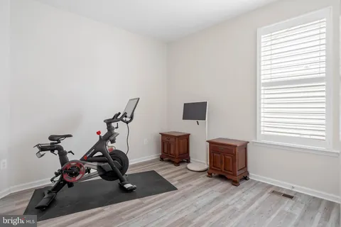 a view of a room with gym equipment