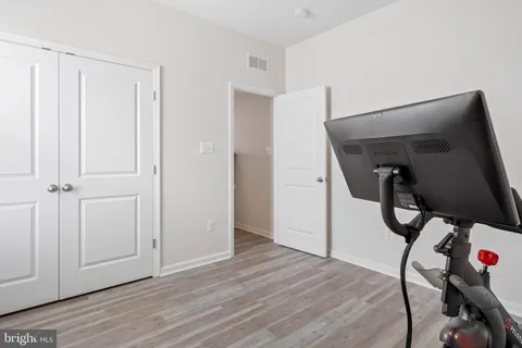 a view of entryway with wooden floor