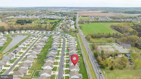 an aerial view of residential building with outdoor space