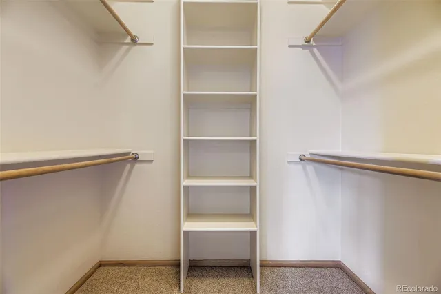 a view of an empty walk in closet