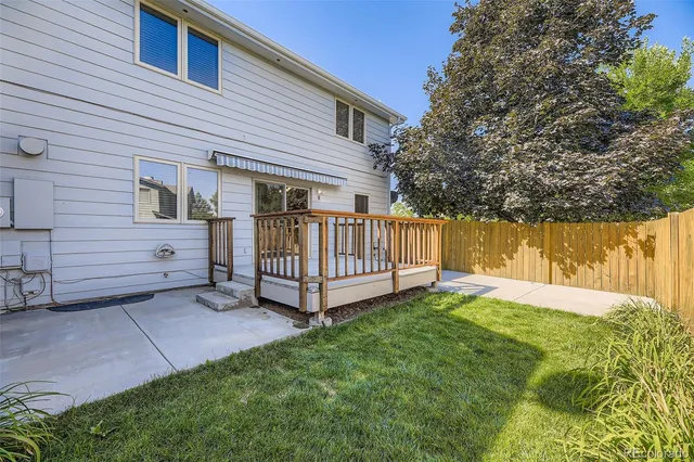 a view of balcony with wooden floor