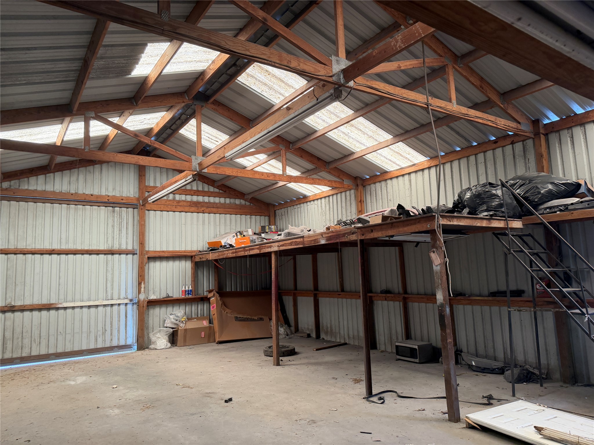 6009 Maple Street Houston, TX 77074 - Photo 10 of 11 a view of an empty room with wooden roof