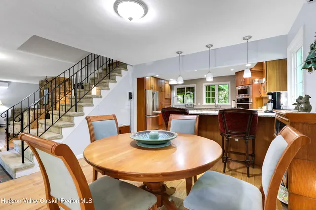 a view of a dining room with furniture