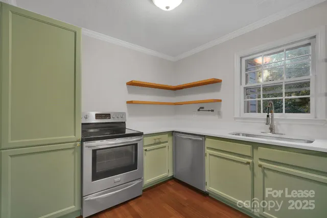 a kitchen with a refrigerator and sink