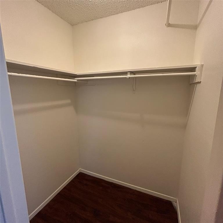 1011 West 23rd Street, Unit 102 Austin, TX 78705 - Photo 8 of 10 a view of small space with racks on the wall