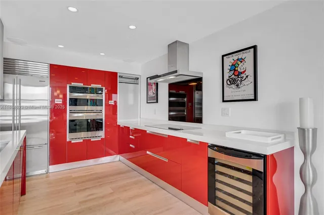 a view of kitchen with furniture and wooden floor