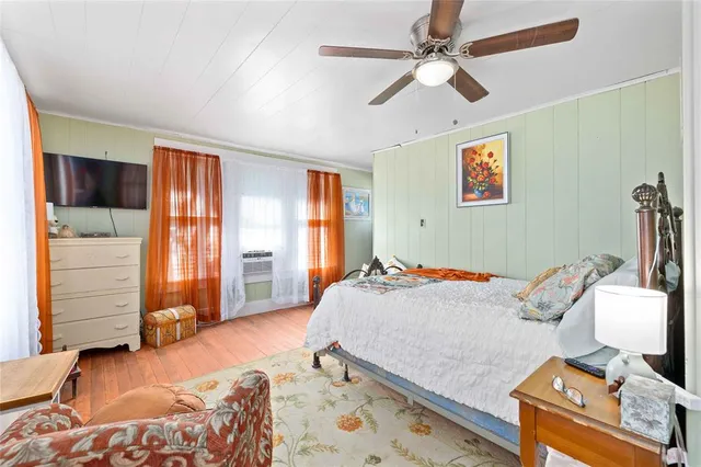 a bedroom with a bed and furniture