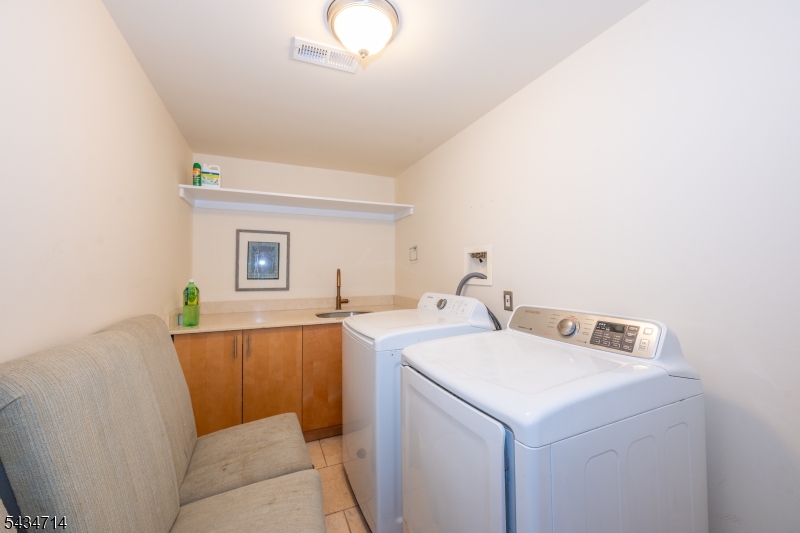 50 Rock Spring Road West Orange, NJ 07052 - Photo 50 of 50 a utility room with dryer and washer