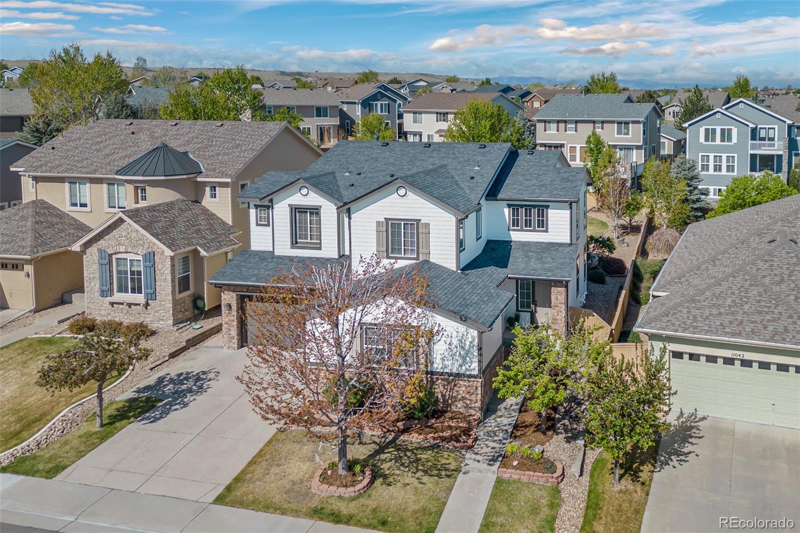 11036 Glengate Circle Highlands Ranch, CO 80130 - Photo 1 of 42 an aerial view of a house