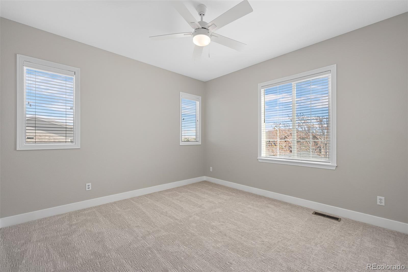 11036 Glengate Circle Highlands Ranch, CO 80130 - Photo 24 of 42 a view of an empty room with a window