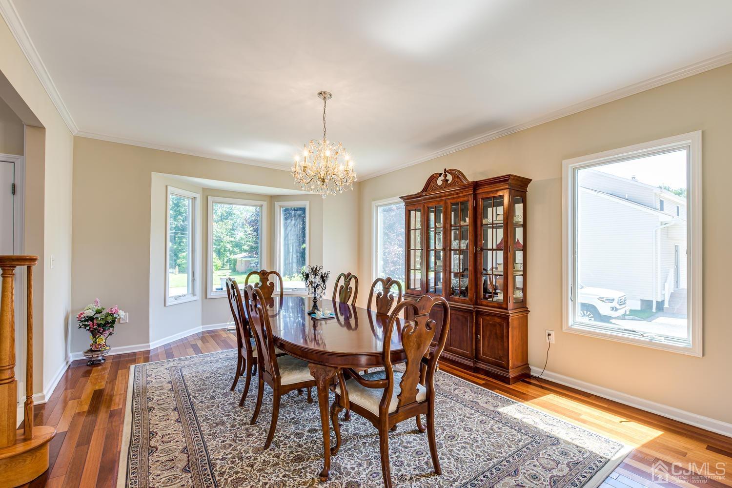 35 Utica Road Edison, NJ 08820 - Photo 14 of 76 a view of a dining room with furniture window and outside view