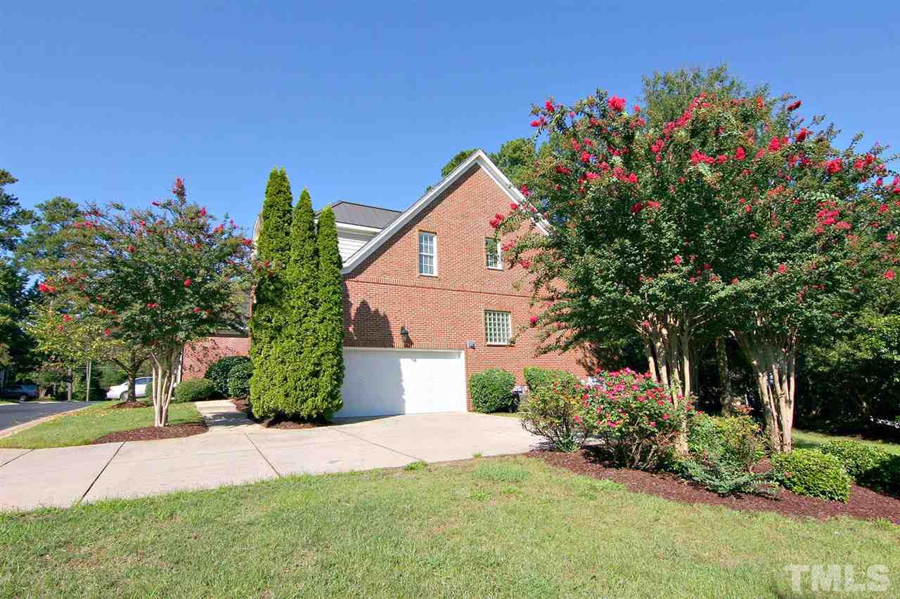 4210 Norman Ridge Lane Raleigh, NC 27613 - Photo 2 of 25 Common area extends side yard for entertaining or playing catch