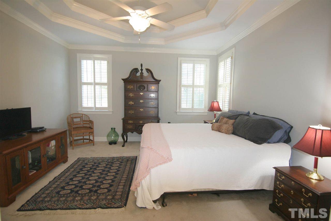 4210 Norman Ridge Lane Raleigh, NC 27613 - Photo 12 of 25 Double tray ceiling and plantation shutters