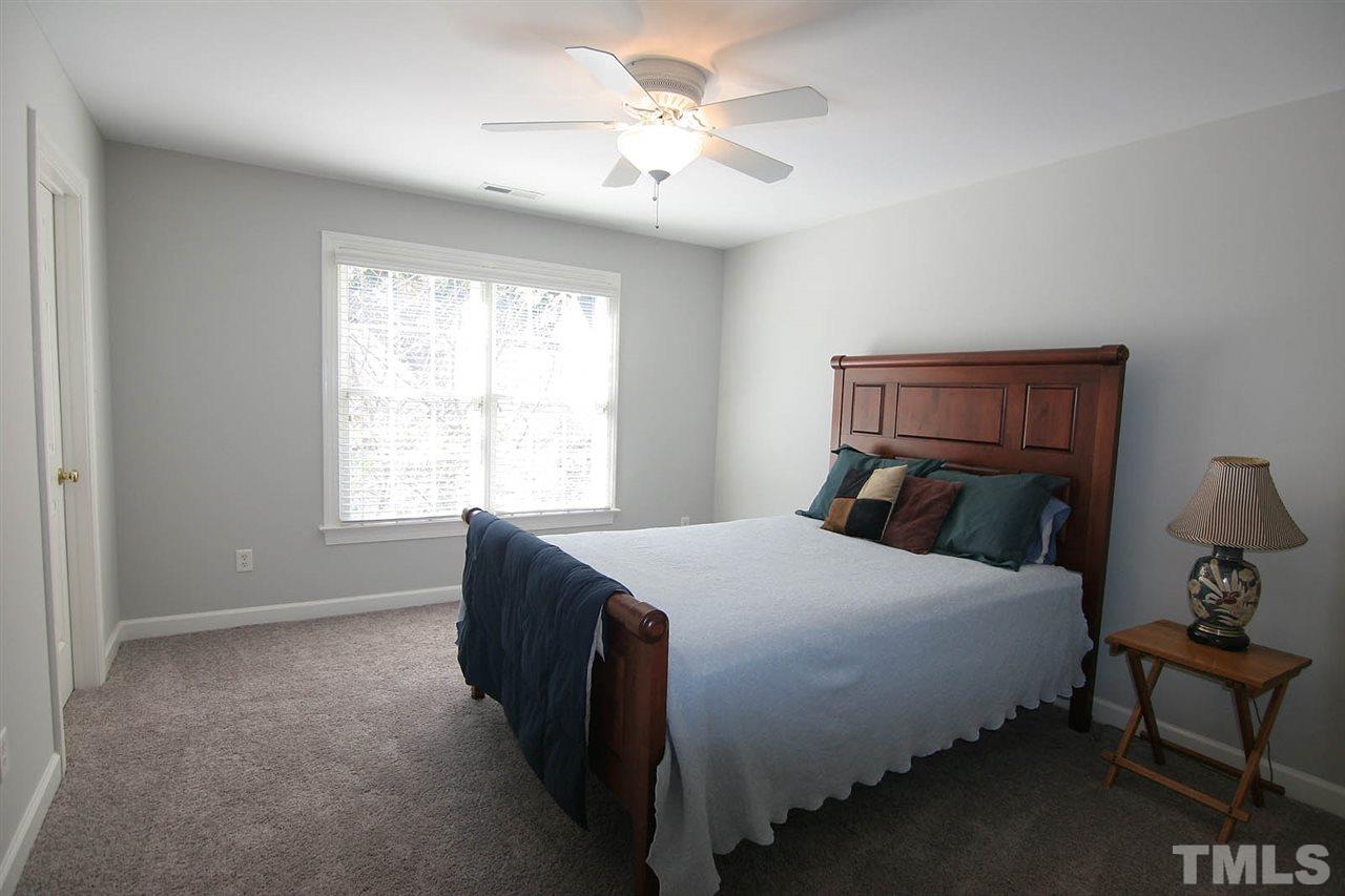 4210 Norman Ridge Lane Raleigh, NC 27613 - Photo 20 of 25 Great guest bedroom with direct bath access.
