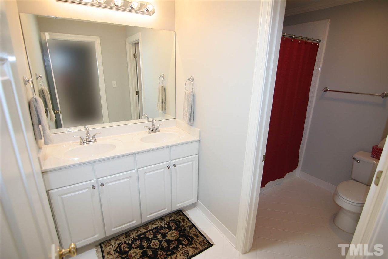 4210 Norman Ridge Lane Raleigh, NC 27613 - Photo 21 of 25 Bedroom 3 has direct access