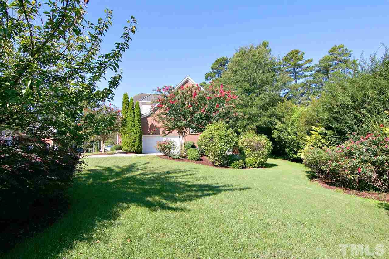 4210 Norman Ridge Lane Raleigh, NC 27613 - Photo 24 of 25 Common area extends the side yard. One of the best lots in the neighborhood.