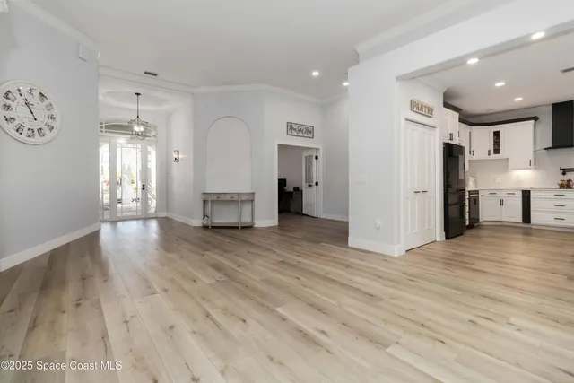 a view of a livingroom with wooden floor