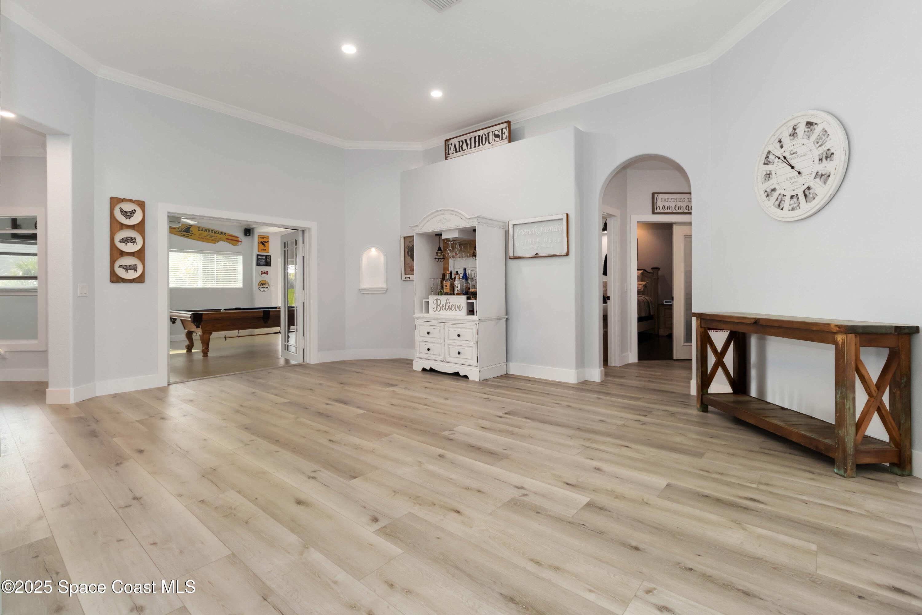 341 Buckskin Street Palm Bay, FL 32909 - Photo 18 of 69 a view of a livingroom with wooden floor