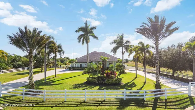 a view of a swimming pool with a garden
