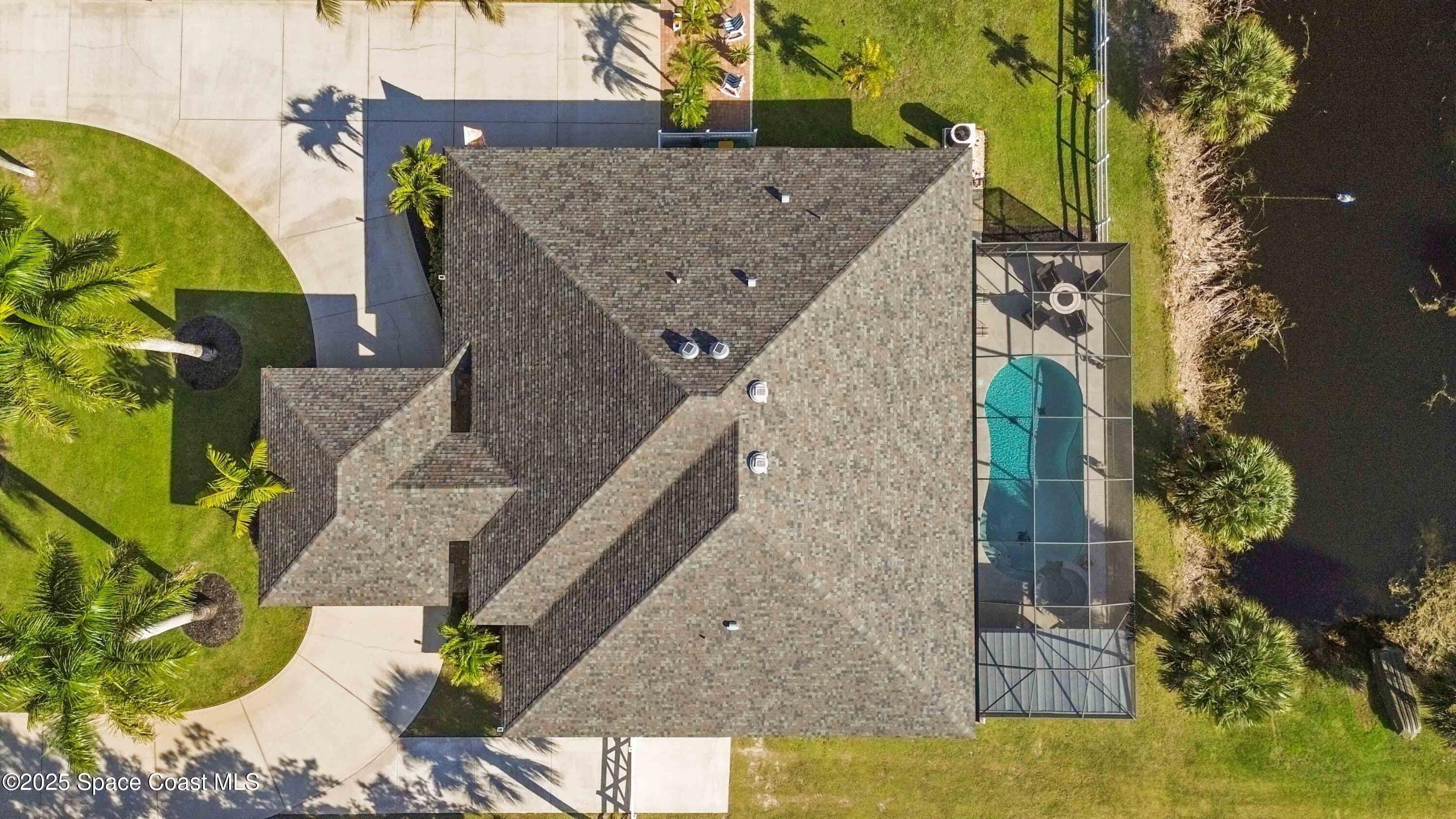 341 Buckskin Street Palm Bay, FL 32909 - Photo 58 of 69 an aerial view of a house with a yard