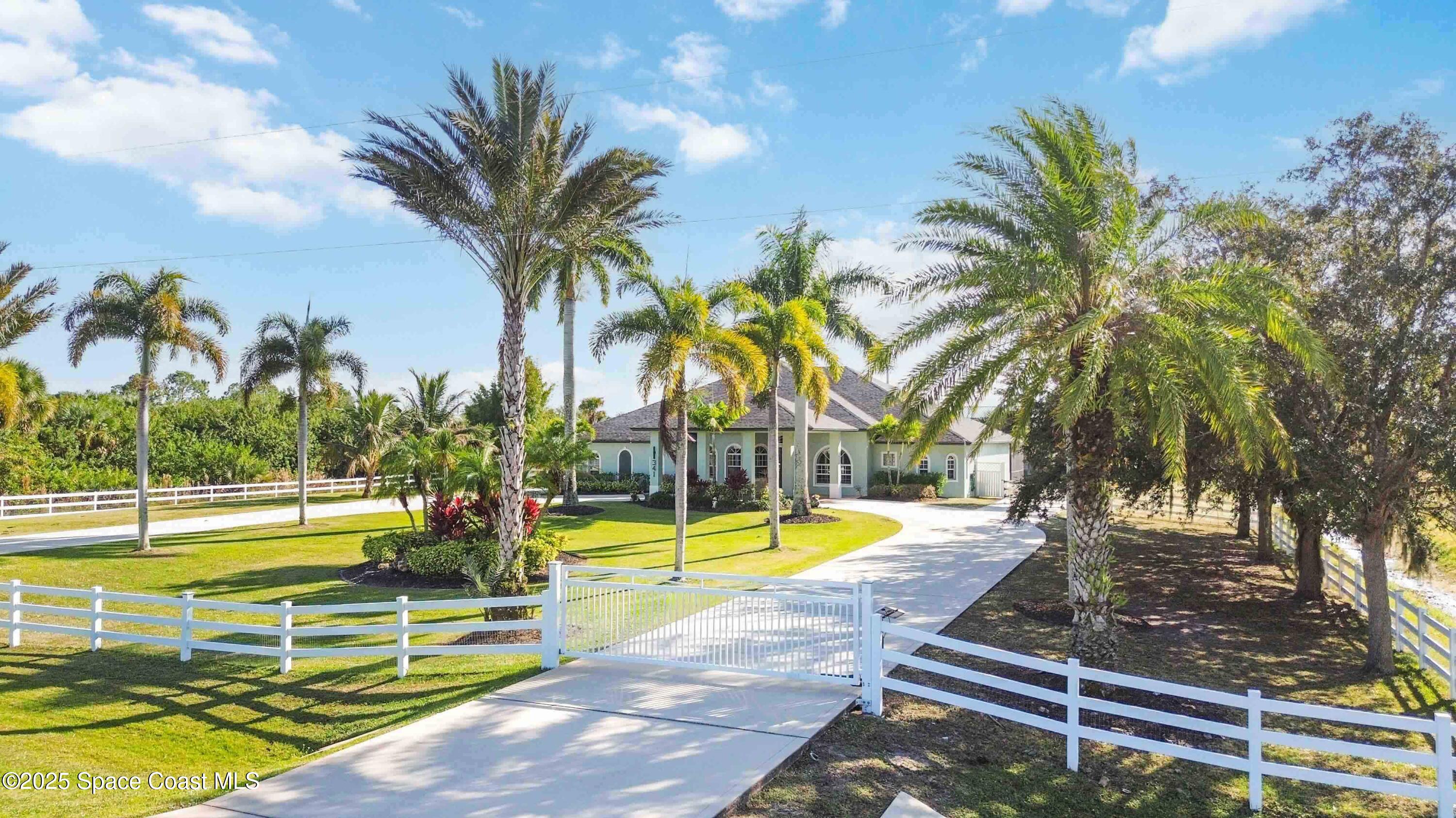 341 Buckskin Street Palm Bay, FL 32909 - Photo 68 of 69 a view of a swimming pool with an outdoor seating
