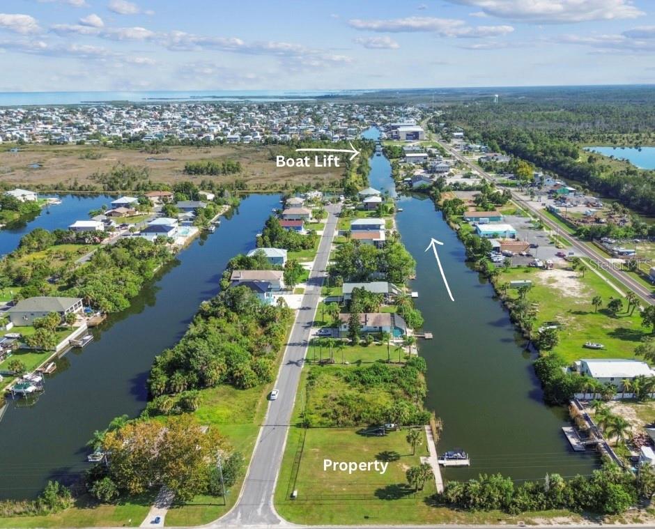 3314 Fernleaf Drive Hernando Beach, FL 34607 - Photo 14 of 33 an aerial view of city and lake view