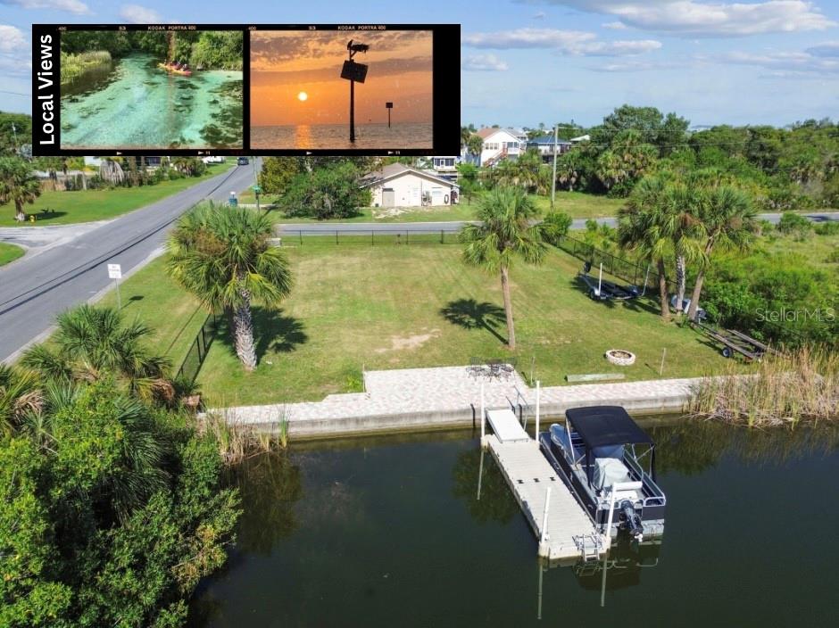 3314 Fernleaf Drive Hernando Beach, FL 34607 - Photo 2 of 33 a view of a lake with a yard