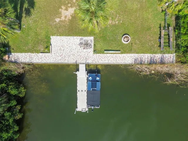 a view of swimming pool with a yard
