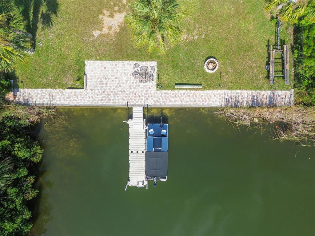 3314 Fernleaf Drive Hernando Beach, FL 34607 - Photo 9 of 33 a view of swimming pool with a yard