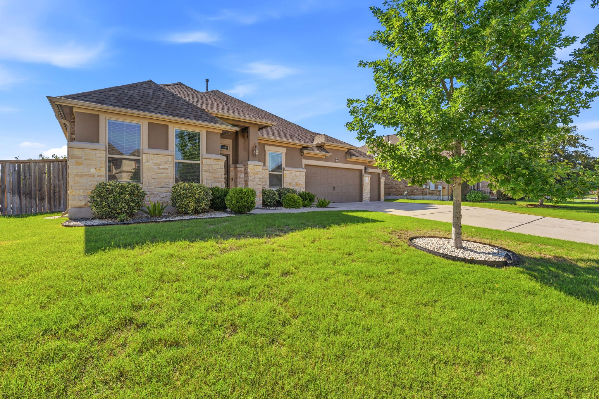 12616 Twisted Root Drive Manchaca, TX 78652 - Photo 5 of 36 Set on a rare quarter-acre lot with no rear neighbors and extra breathing room beside the community trail.