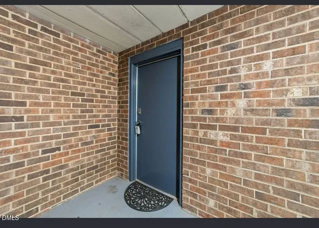 a view of a swimming pool with a yard