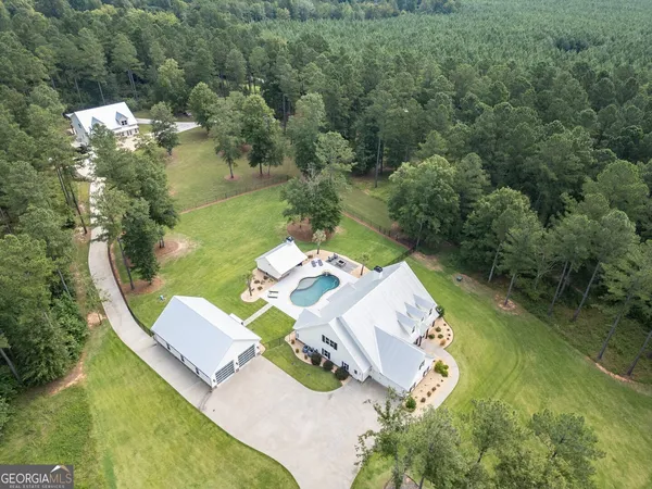 a living room with furniture or couch and a wooden floor