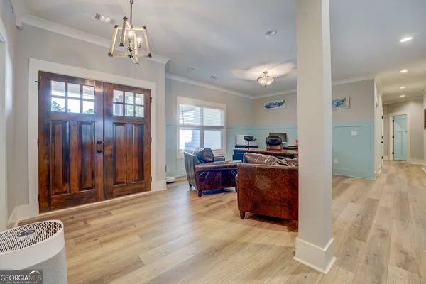 a view of an empty room with a window