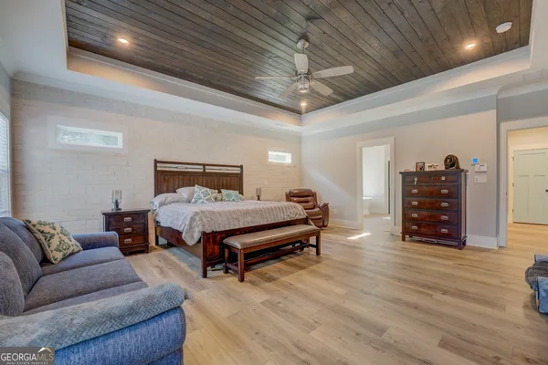 a view of a house with pool table and chairs