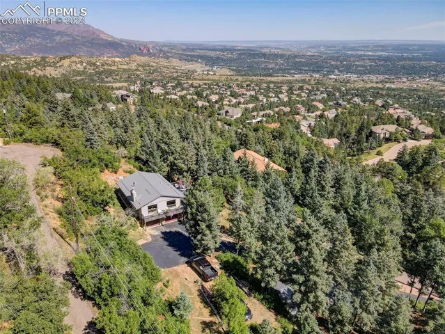 an aerial view of residential house with outdoor space