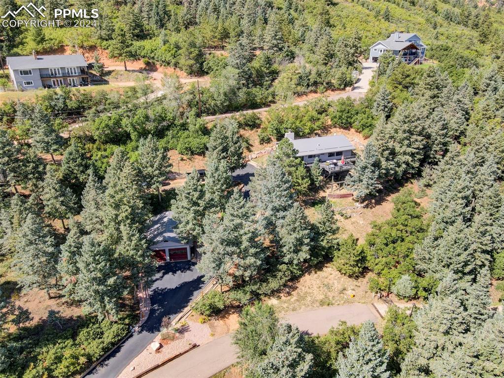 1306 Limerock Lane Colorado Springs, CO 80906 - Photo 34 of 50 an aerial view of residential house with outdoor space
