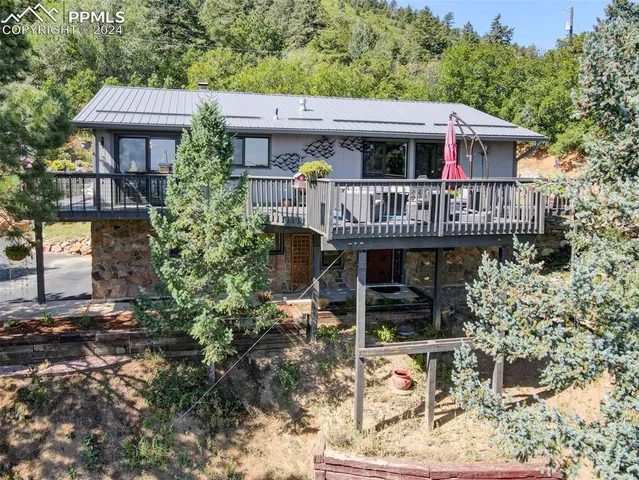 a view of a house with roof deck