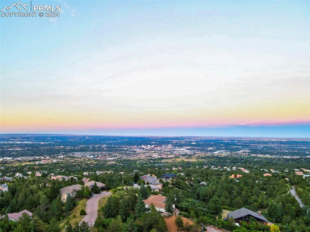 1306 Limerock Lane Colorado Springs, CO 80906 - Photo 48 of 50 an aerial view of residential houses with city view and mountain view